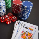 stack of chips playing cards dice