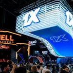 1xbet stand at industry event with people below