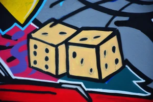 dice graffiti on wall