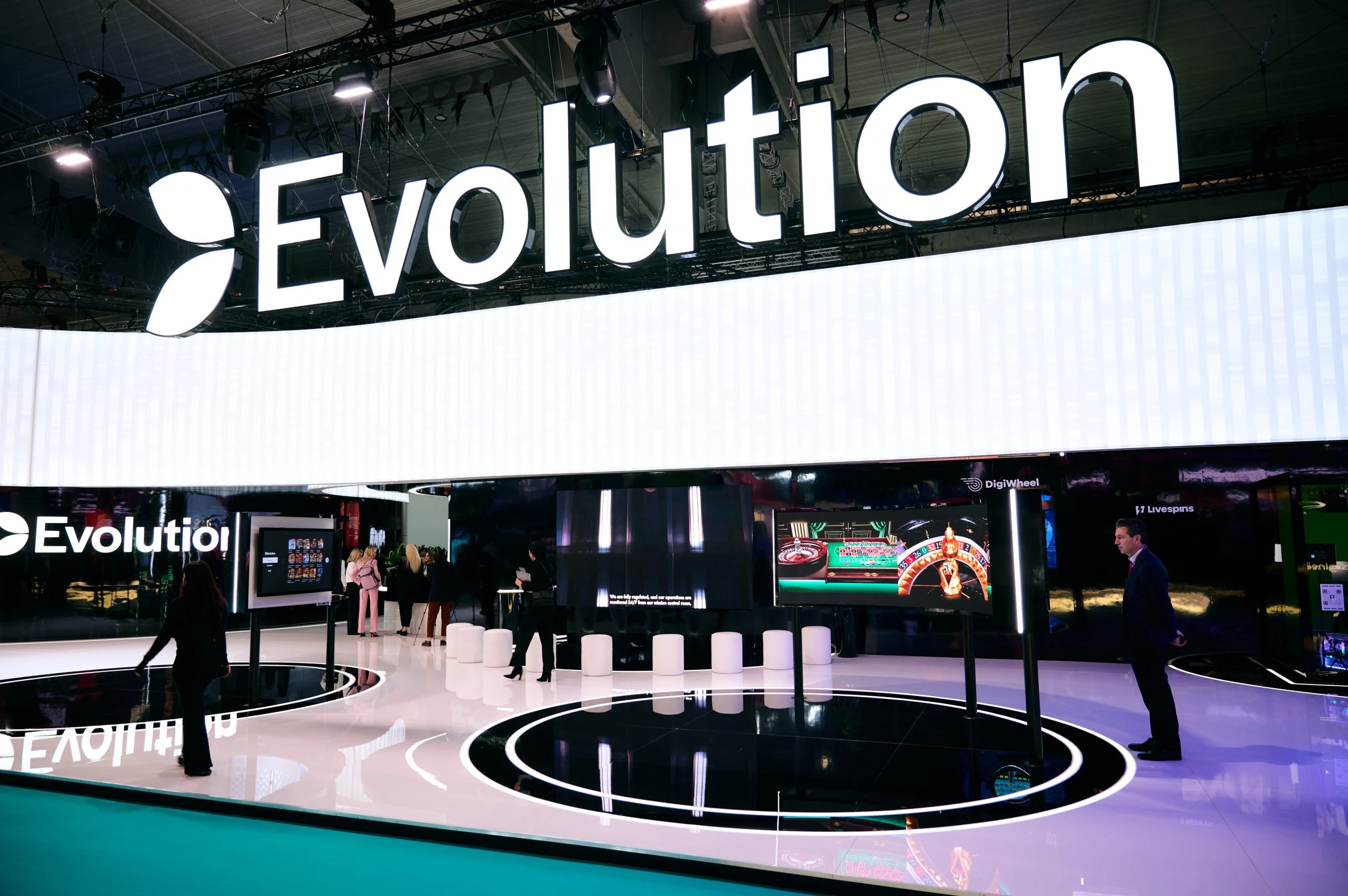 Evolution logo displayed at ICE Barcelona 2025, as compliance failures come to light in unsealed court report