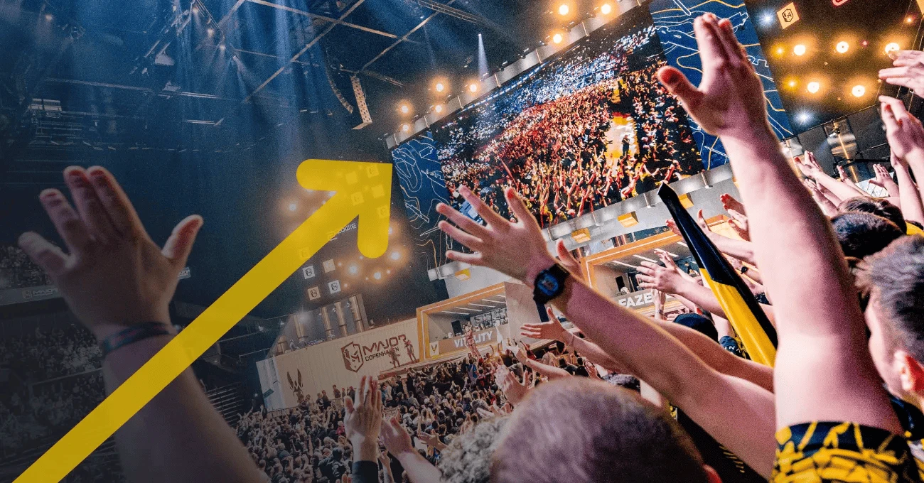 Esports fans at a tournament with a yellow arrow indicating progress