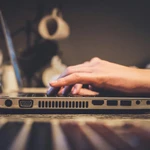 person using laptop