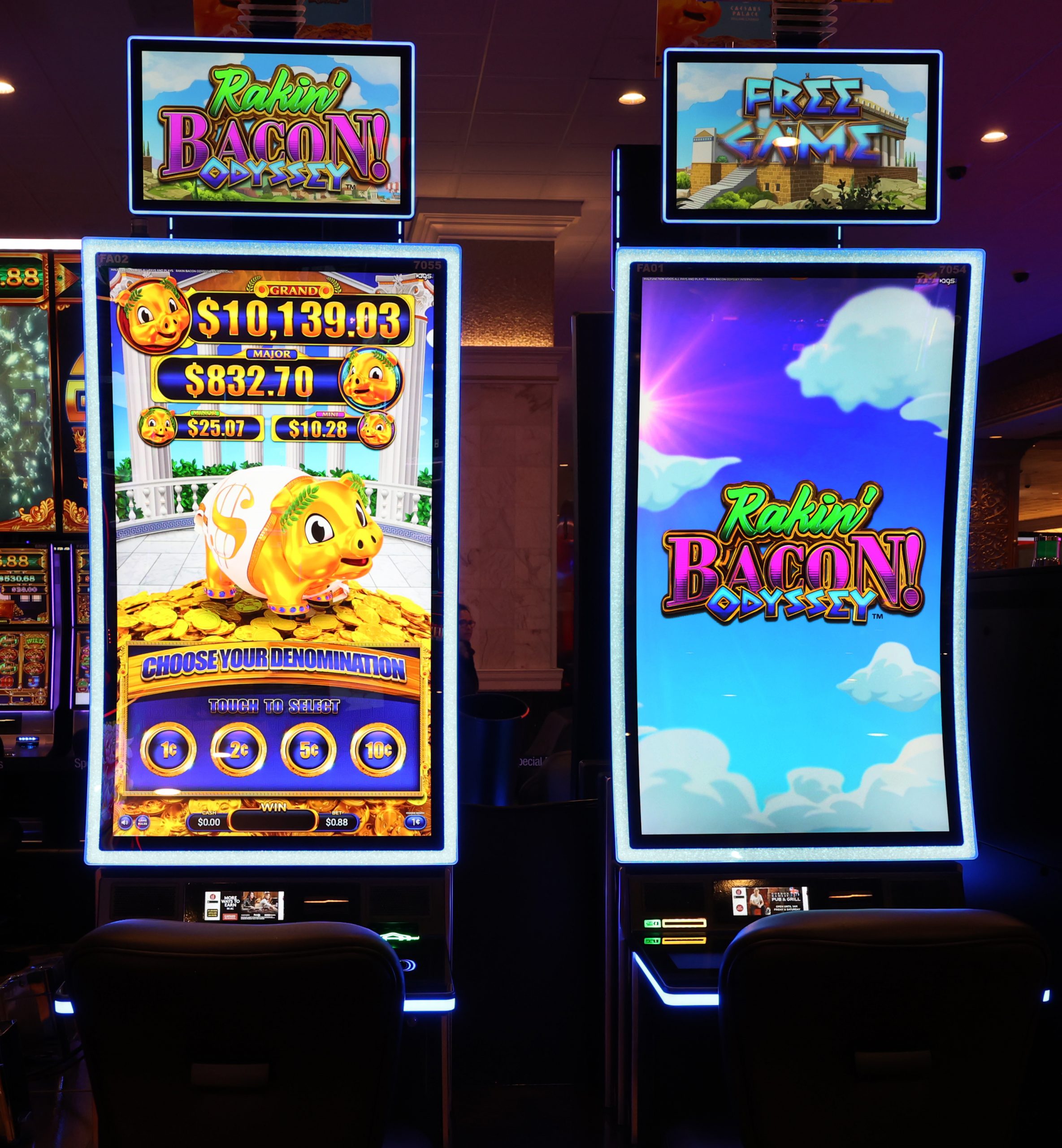 Slot cabinets at Caesars Atlantic City featuring the Rakin Bacon Odyssey game