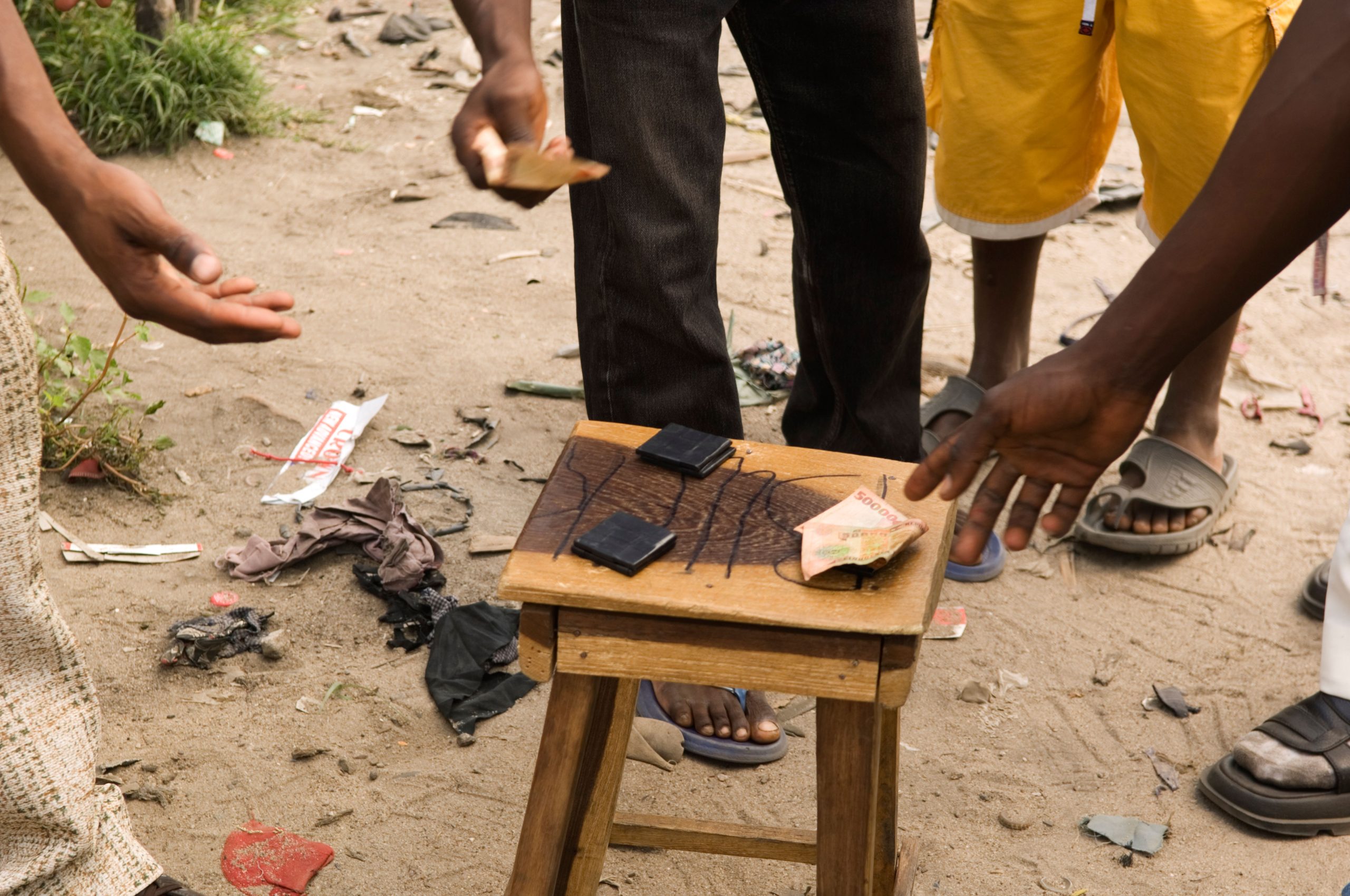 Informal gambling game in Africa on a stall